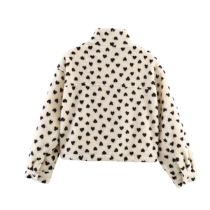 Back view of a white teddy fleece baseball jacket with black heart patterns and high collar