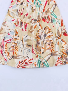 Short sleeve A-line dress with vintage abstract tropical print and V-neckline
