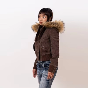 Detail of detachable faux fur collar on brown short denim bomber jacket for women