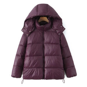 Detail view of winter hooded puffer jacket with quilting and adjustable drawstring hem