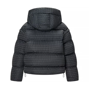 Rear view of hooded puffer jacket with geometric quilted texture and drawstring detail