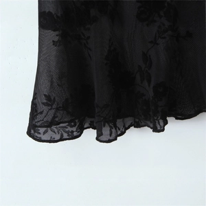 French chic black mini dress featuring sheer mesh fabric with floral velvet flocking details