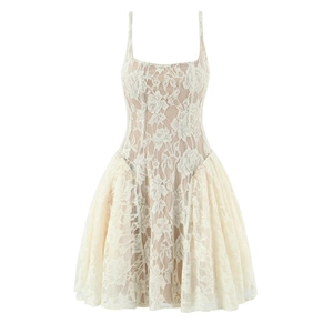 Close-up detail of cream lace mini dress with delicate floral mesh and spaghetti straps