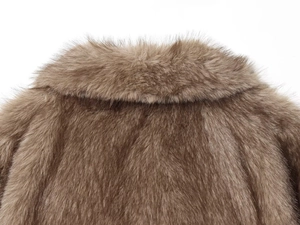 Close-up of the plush faux fur collar in brown showing high-quality texture and fibers