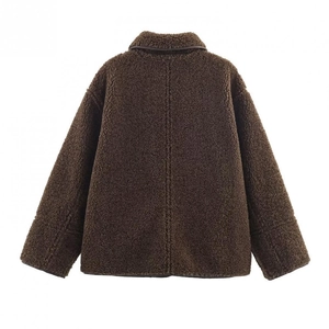 Rear view of brown teddy fleece jacket with loose boxy fit and dropped shoulders