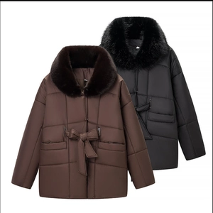 Detailed view of padded winter jackets with detachable faux fur collars and waist belts