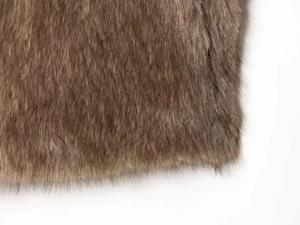 Detailed close-up of dark brown faux fur texture with soft and dense plush fibers
