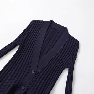 Slim fit navy blue ribbed knit cardigan with V-neckline and black buttons