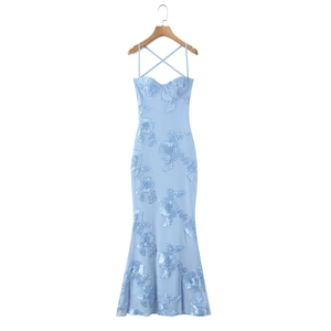 Detail of light blue mermaid dress with 3D floral embroidery and mesh texture
