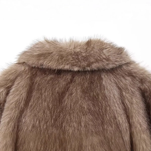 Women's brown faux fur vest with lapel collar and plush texture detail on white background