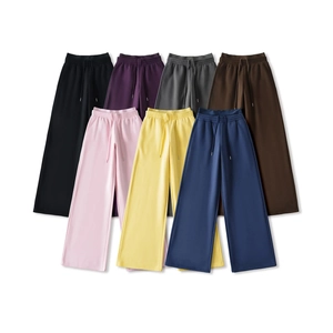 Flat lay of wide leg fleece sweatpants in seven colors including coffee and grey