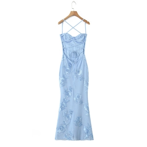 Detailed back view of light blue mesh mermaid dress with floral embroidery and lace-up straps