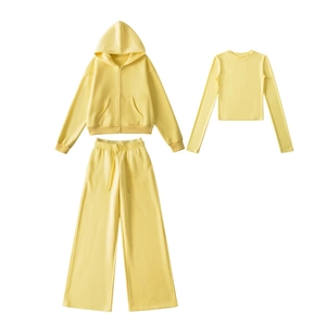 Three-piece light yellow leisure set with zip hoodie, drawstring pants and crop top
