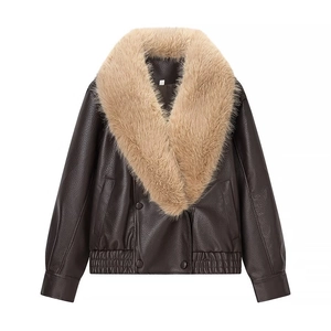 Detail of dark brown faux leather jacket featuring a plush detachable faux fur collar