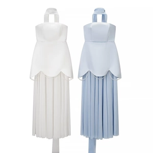 Detail of satin pleated tube dresses with scalloped pearl trim in white and light blue