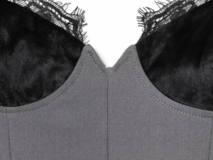 Detail view of lace eyelash trim and velvet bodice on this slim fit V-neck strap dress
