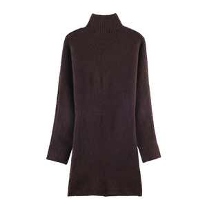 Detailed view of dark brown knitted dress showing high collar and soft plush texture