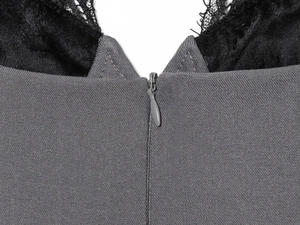 Detail of grey twill fabric with black eyelash lace trim and invisible back zipper