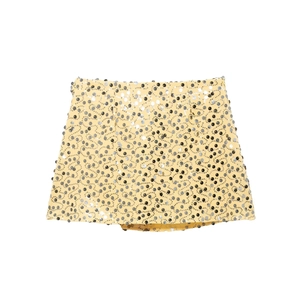 Detail of light yellow mini skirt with intricate wave pattern sequins and high waist