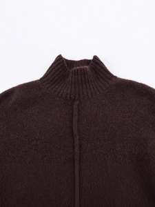 Elegant dark brown high neck knit dress with textured wool blend and vertical seam detail