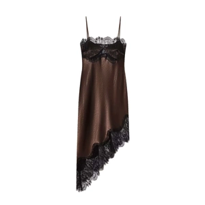 Detail of satin slip dress featuring brown fabric with black eyelash lace trim