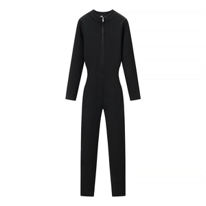 Detail of black ribbed knit bodysuit featuring a high collar and metal front zipper