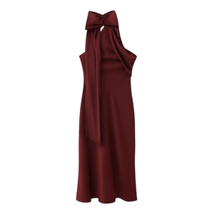 Elegant burgundy satin halter midi dress with asymmetric bow and backless design
