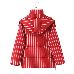 Detail of red and white striped padded jacket with horizontal quilting and drawstring hem