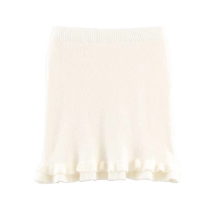 Detailed view of the cream white knitted mini skirt with elegant ruffle hem detail