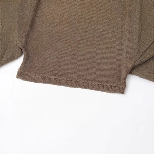 Brown long sleeve knit sweater featuring high quality textured waffle knit fabric hem detail