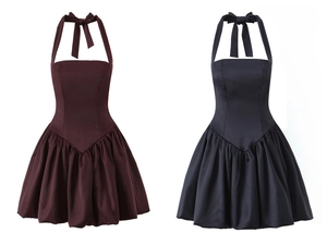 Detail view of backless halter mini dresses with bow tie straps in red and black