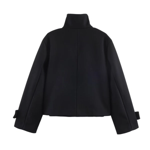 Back view of black stand collar jacket with adjustable buckle cuffs and seam detail