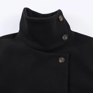 Women's black standing collar coat with textured marble-patterned button details