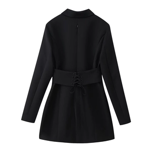Detailed back view of a black blazer dress featuring adjustable lace-up waist with metal eyelets