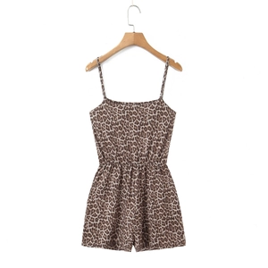 Detail of leopard print romper featuring adjustable spaghetti straps and elastic waist