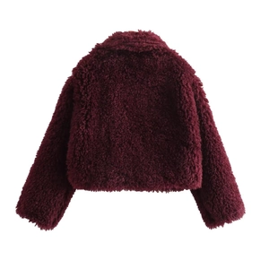 Detailed back view of a plush burgundy teddy faux fur jacket with wide lapel collar
