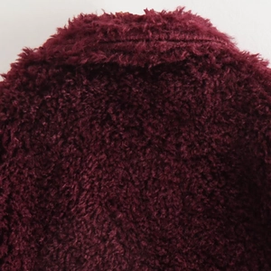 Faux shearling fluffy jacket in wine red color featuring thick textured fleece fabric