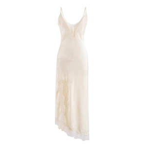 Detail of champagne satin dress showing delicate lace trim and silk texture finish