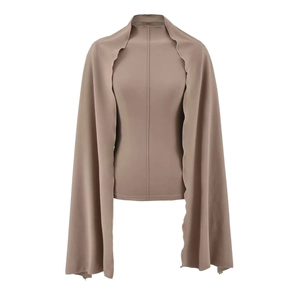 Detail of tan velvet base top with layered shawl and ruffled edges for a slim fit