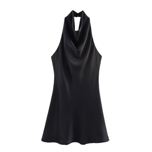 Detail of black satin cowl neck halter top with elegant silky texture and drape