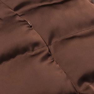 Detailed macro view of high-quality invisible zipper on brown satin fabric garment
