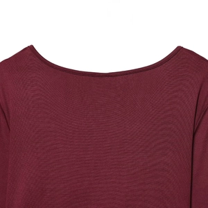 Fashionable deep red knit long sleeve top with a V-neck and stylish knot detail