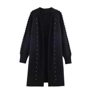 Women's long black knit cardigan with rivet studs and ribbed texture on white background