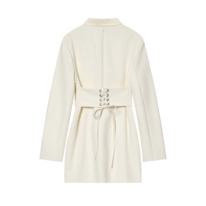 Detail view of the back lace-up waist design on this cream white blazer mini dress