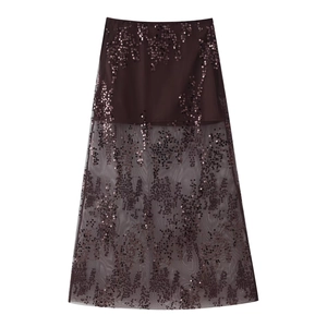 Détail de la jupe en tulle marron café à paillettes avec résille et doublure intérieure