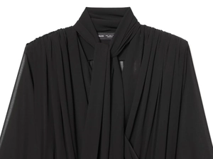 Detailed view of the necktie bow and pleated texture on this black chiffon shirt