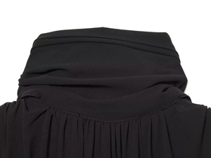 Macro shot of elegant black chiffon high-neckline with pleated drape details