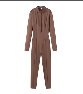 Detail of slim-fit brown bodysuit featuring a stand collar and half-zipper design