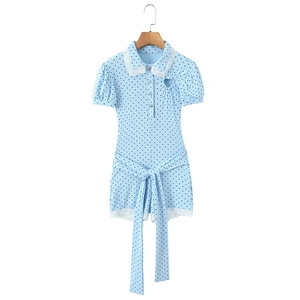 Light blue polka dot romper with white lace collar and heart cutout detail