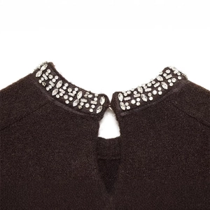 Women's crewneck knit sweater featuring elegant silver rhinestone collar decoration